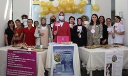 Vali Yiğitbaşı, emzirmenin önemini erkeklerle poz vererek dikkat çekti