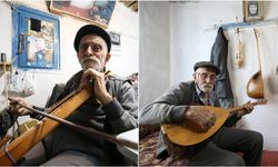 85 yaşındaki kadın  kemençe çalıyor