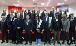 Akademik yükseltme töreninde cübbe giydiler