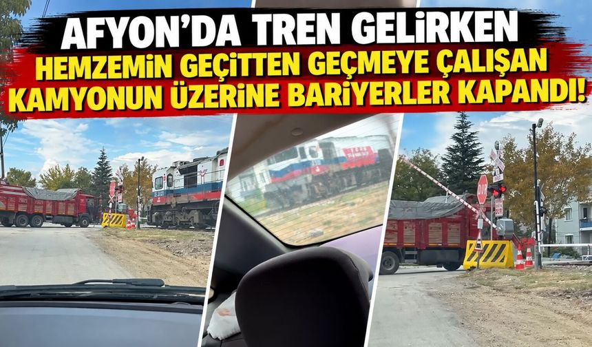 Afyon’da tren gelirken hemzemin geçitten geçmeye çalışan kamyonun üzerine bariyerler kapandı!